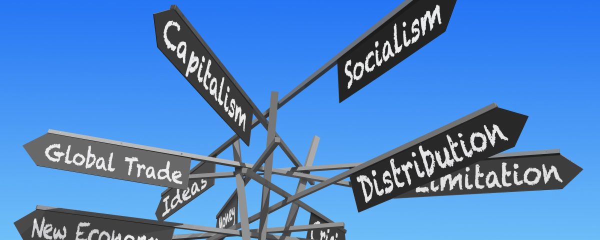 Differences between socialism, communism, and free market economies